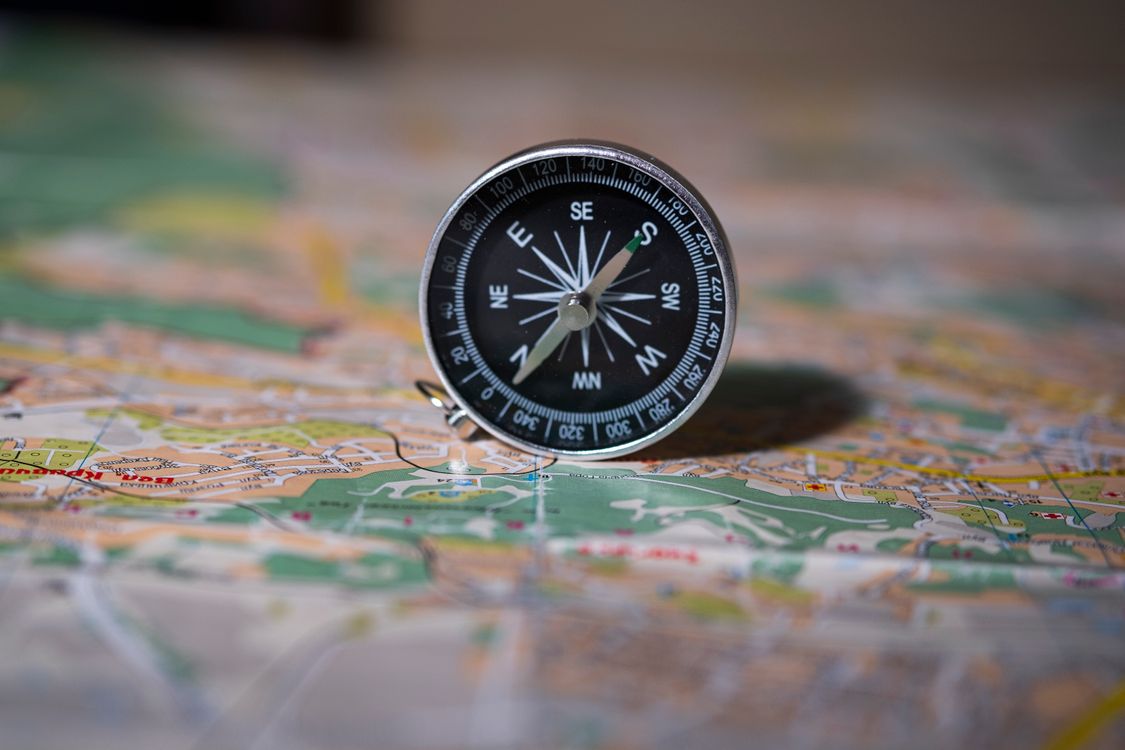 Compass pointing the way, representing leadership direction